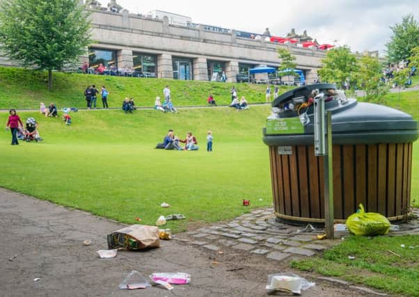 Bins overflow leaving rubbish across Princes Street Gardens East. Picture: Ian Georgeson