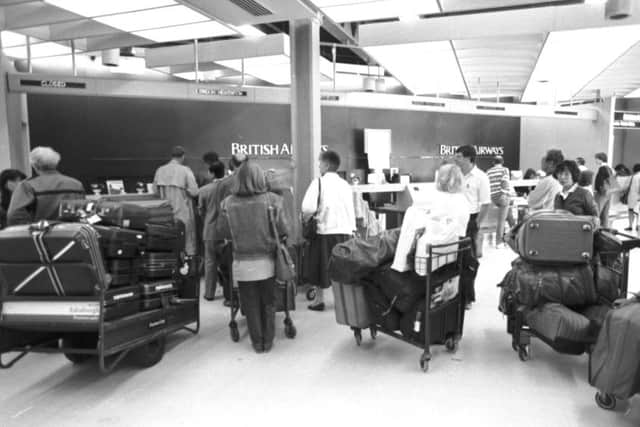 Passengers at the British Airways check-in desk at Edinburgh Airport in 1989