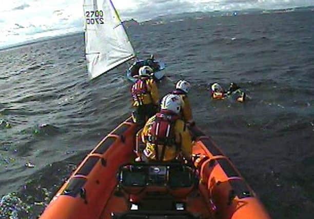 Kinghorn Lifeboat's crew rescues a woman from the water