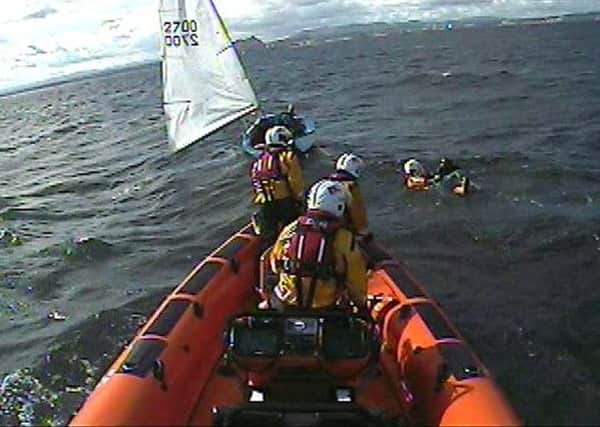 Kinghorn Lifeboat's crew rescues a woman from the water