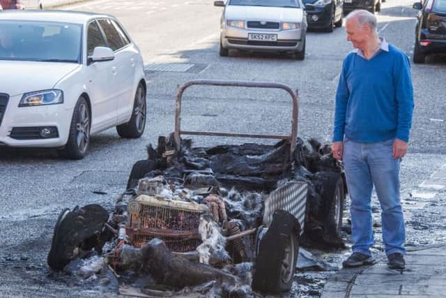 Alex Davidson surveys the damage. Picture: Scott Taylor