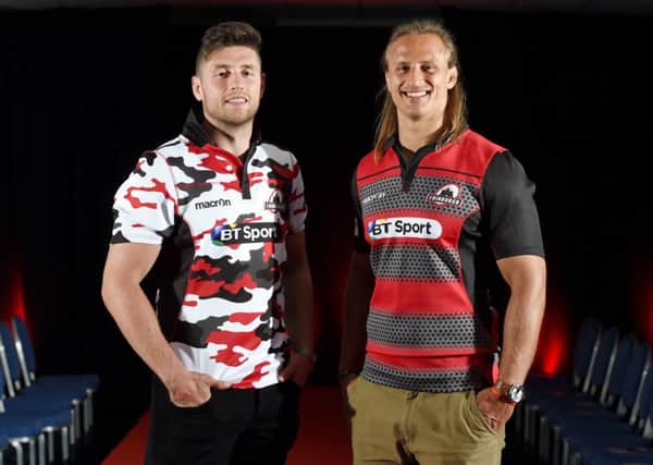 Jack Cuthbert, left and Anton Bresler model the new kits. Picture: SNS