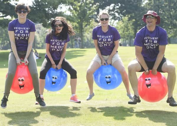 : ERI consultants, from left, Katy Letham, Lindsay Reid, Emma-Beth Wilson and Dave Caesar enjoy more sedate exercise at the Medic One fundraiser. Picture: Greg Macvean