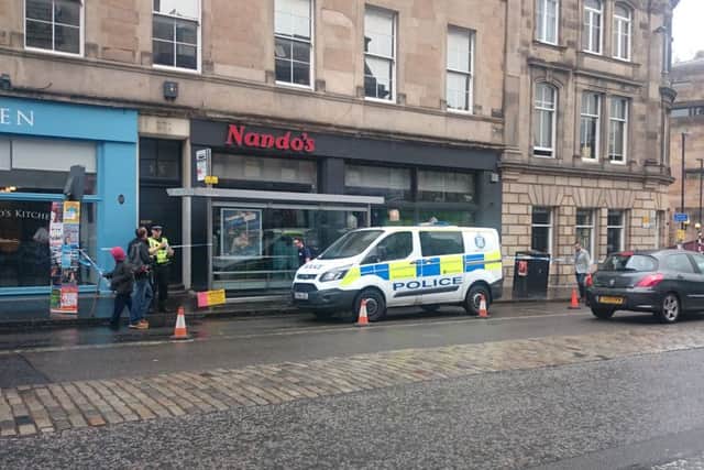 the area around Nandos has been sealed off. Picture: Kaye Nicolson