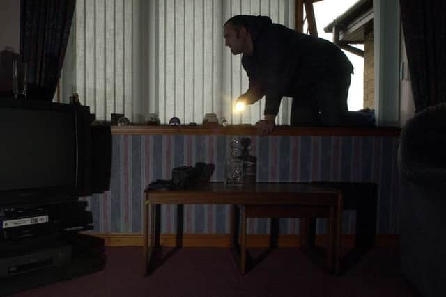 Edinburgh has a robbery problem, according to Sir Stephen House. Picture: Ian Rutherford (Posed by model)