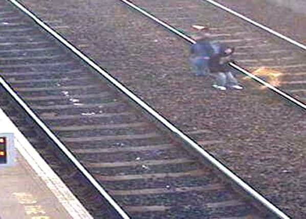 Youngsters have been caught on CCTV during a near-miss at Wester Hailes. Picture: British Transport Police