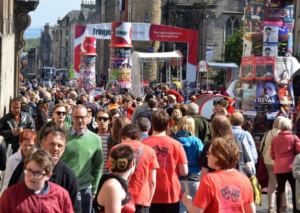 The High Street is packed with Fringe-goers. Picture: Jon Savage