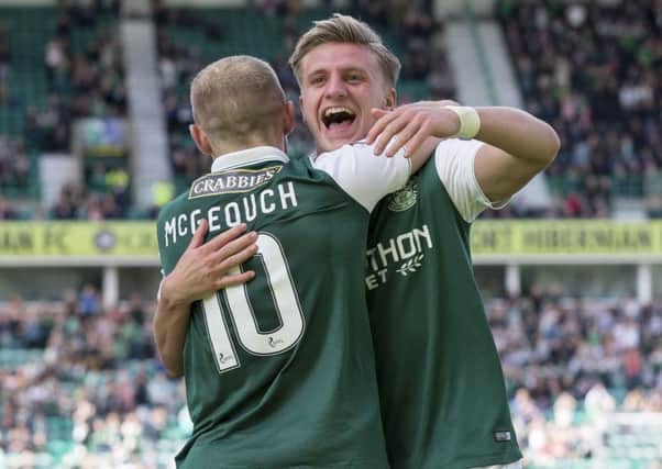 Joy is etched on Jason Cummings' face after he makes the points safe for Hibs. Picture: SNS