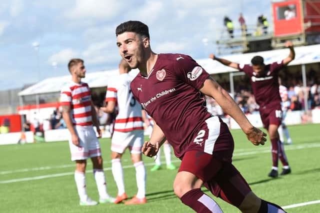 Callum Paterson scored, but was sent off as Hearts were hit by a late Accies winner. Picture: David Lamb