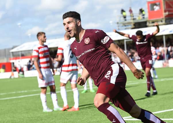 Callum Paterson scored, but was sent off as Hearts were hit by a late Accies winner. Picture: David Lamb