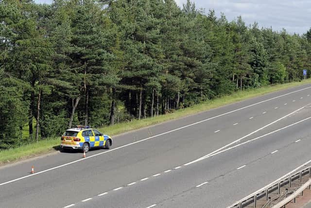Police at the scene of the M9 crash, which the Bilston Glen control hub failed to log. Picture: Michael Gillen