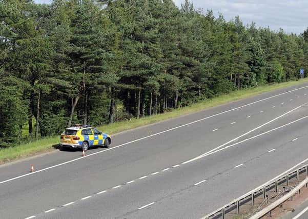 Police at the scene of the M9 crash, which the Bilston Glen control hub failed to log. Picture: Michael Gillen