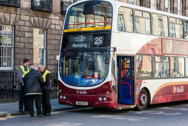 A Lothian Bus was damaged in the crash. Picture: Ian Georgeson