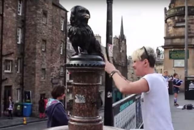 Cat Myers drums with Greyfriars Bobby. Picture: Comp