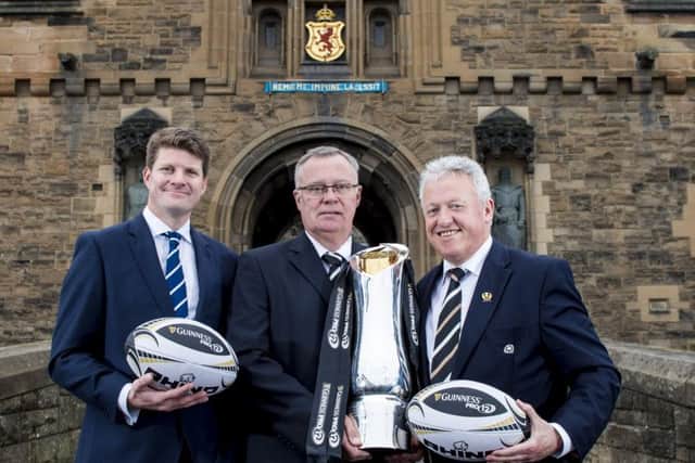The SRUs Dominic McKay, left, joined PRO12 Rugby tournament director David Jordan and SRU board member Edward A Crozier, right, at Edinburgh Castle to unveil BT Murrayfield as the venue for the 2016 Guinness PRO12 Final