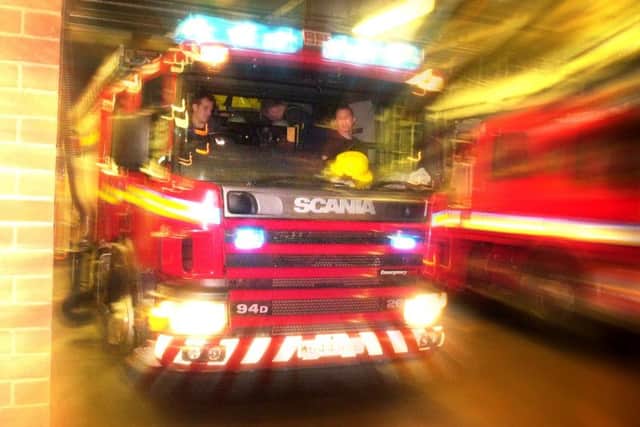 Fire crews saved four people from the flats. Picture: Tony Marsh