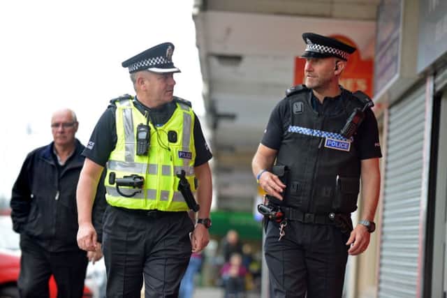 Stephen Sutherland and Kevin Weaver on the beat in Drylaw. Picture: Jon Savage