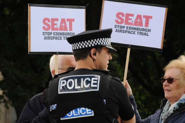 Campaigners protest outside the Scottish Parliament. Picture: Lisa Ferguson