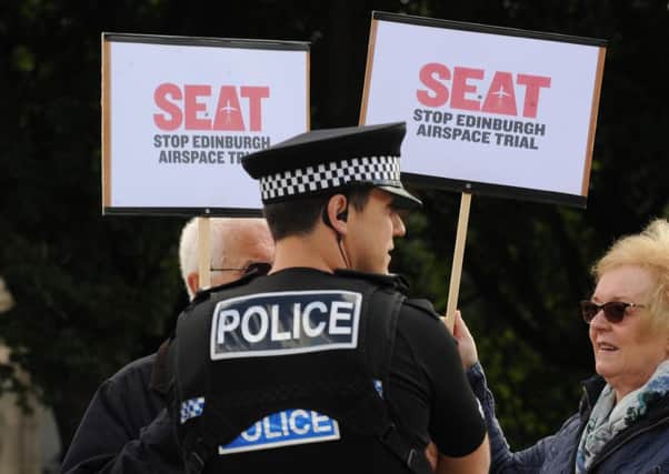 Campaigners protest outside the Scottish Parliament. Picture: Lisa Ferguson