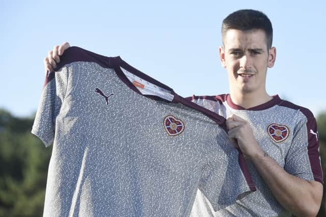 Jamie Walker models the kit which features 8000 names. Picture: Greg Macvean