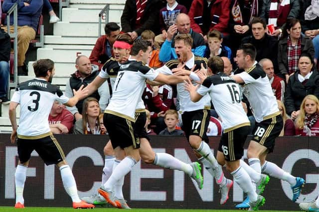 Aberdeen celebrate David Goodwillie's opening goal. Pic: Lisa Ferguson