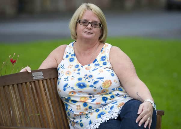 Susan Stewart on a bench in memory of son Josh. 
Picture: Ian Rutherford