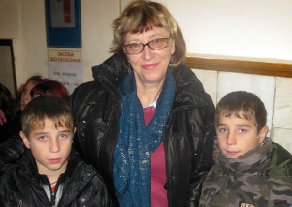 Ira Polyashova with some of the children from the orphanage. Picture: Contributed