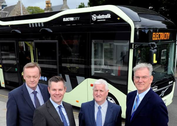 From left, Lothian Buses Bill Devlin, transport minister Derek Mackay, Jim McFarlane of Lothian Buses and Adrian Wickens of Volvo launch the new buses. Picture: Lisa Ferguson
