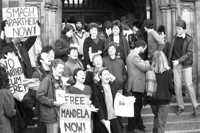 Edinburgh University's Anti-Apartheid society protest outside Teviot Row House in 1984; below, a sit-in protest against rent increases in 1979