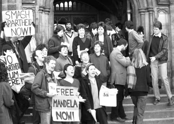 Edinburgh University's Anti-Apartheid society protest outside Teviot Row House in 1984; below, a sit-in protest against rent increases in 1979