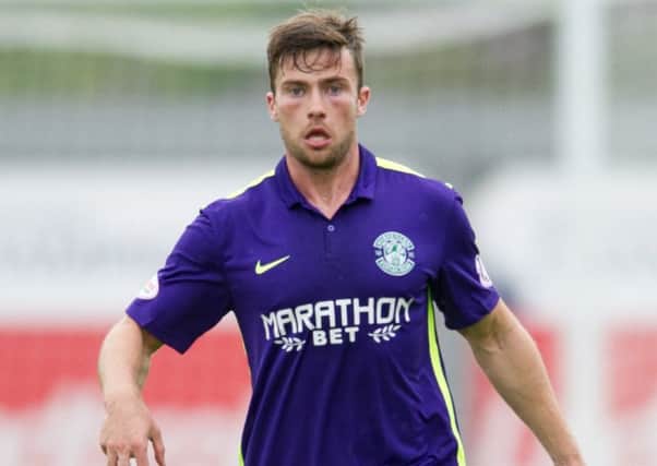 Lewis Stevenson admits Hibs are playing catch-up on Rangers. Picture: John Devlin