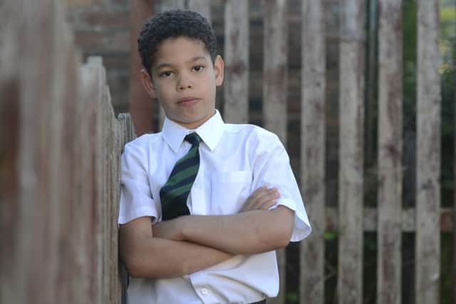 Keir Wallace, who had to be carried to and from the school. Picture: Neil Hanna