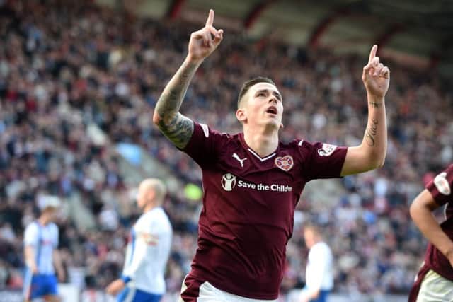 Hearts' Jamie Walker celebrates his goal  but it wasn't quite enough to secure all three points. Picture: SNS