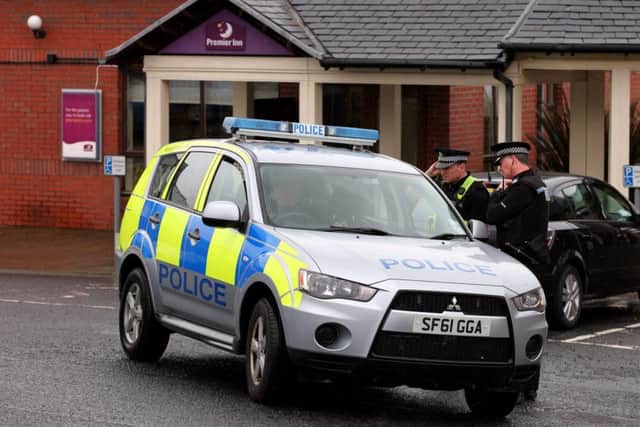 The two women died after being discovered at the Premier Inn, Greenock.