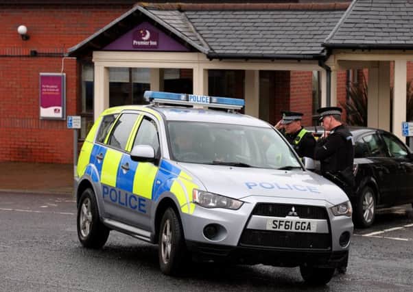 The two women died after being discovered at the Premier Inn, Greenock.