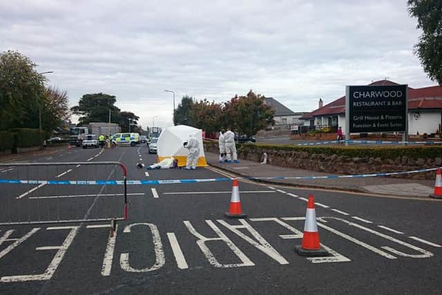 Forensic staff are searching the area. Picture: Kaye Nicolson