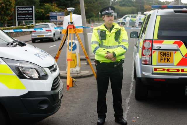 Police at the scene of the crash. Picture: Toby Williams