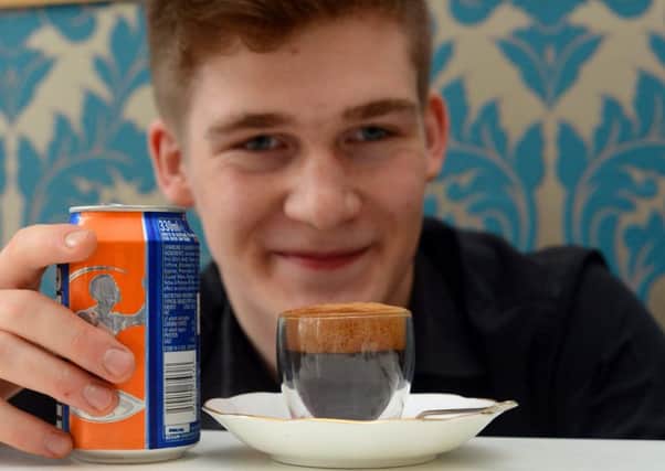 Barista Daniel Todd in Brodie's Cafe in Linlithgow making his new coffee - with Irn Bru. Picture: HEMEDIA