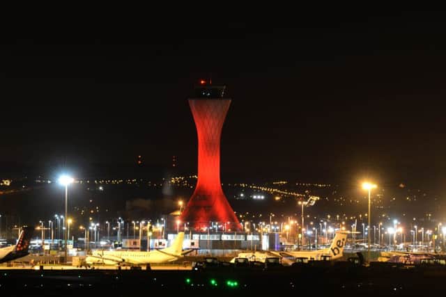 Edinburgh Airport control tower turned red to mark this year's Scottish Poppy Appeal. Picture: Mark Owens