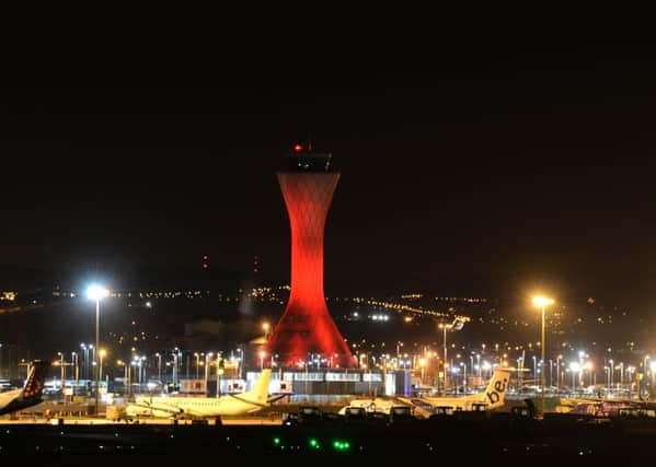 Edinburgh Airport control tower turned red to mark this year's Scottish Poppy Appeal. Picture: Mark Owens
