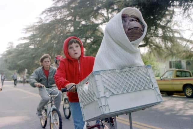 Elliott (Henry Thomas) takes E.T. back to the forest in the 1982 film. Picture: AP