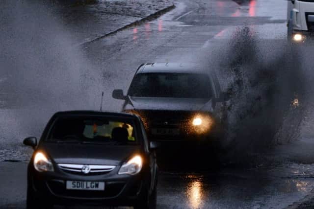 Motorists navigate heavy rain and flooding in Glasgow. Pic: HEMEDIA.