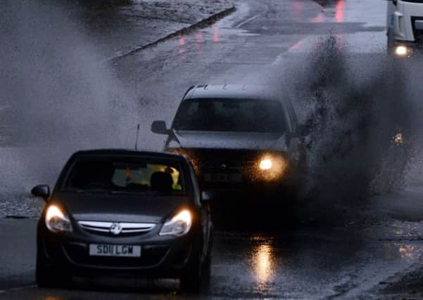 Motorists navigate heavy rain and flooding in Glasgow. Pic: HEMEDIA.
