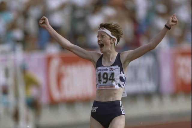 Yvonne Murray raising her arms in victory after winning the 10000 Metres final at the 1994 Commonwealth Games. Picture: Allsport