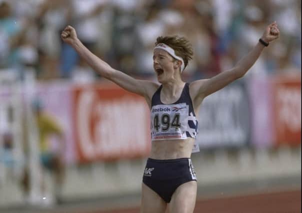 Yvonne Murray raising her arms in victory after winning the 10000 Metres final at the 1994 Commonwealth Games. Picture: Allsport