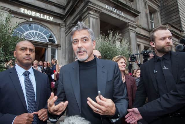 Hollywood actor George Clooney leaves Tigerlily. Picture: Hemedia