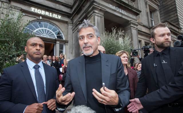 Hollywood actor George Clooney leaves Tigerlily. Picture: Hemedia