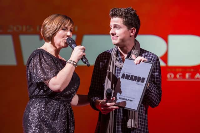 Arlene Stewart presents Best artist award to Charlie Puth