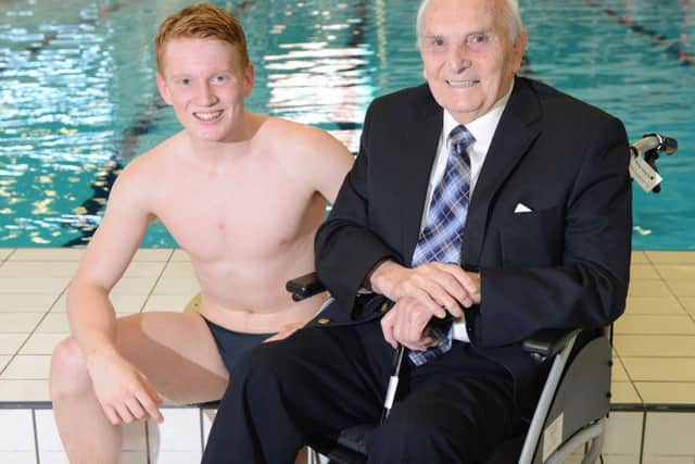 Sir Peter Heatly with his grandson James Heatly, who is also a diver and who won gold, silver and bronze at the European Games