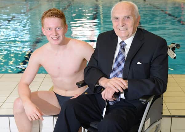 Sir Peter Heatly with his grandson James Heatly, who is also a diver and who won gold, silver and bronze at the European Games